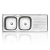 Stainless steel double kitchen sink with a built-in drainer on the right, reflecting on a glossy surface below. Its called Drop in Sink Double 1200X500