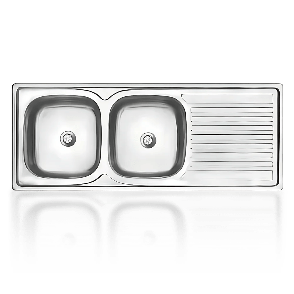 Stainless steel double kitchen sink with a built-in drainer on the right, reflecting on a glossy surface below. Its called Drop in Sink Double 1200X500