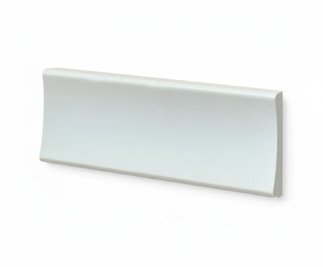 Two geometric shapes: a rounded triangular piece on the left and a rectangular piece on the right, both in light colors. Its Called EPS Plain Cornice 11mmx85mmx2m