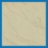 Light beige marble tile with subtle veins, featuring a smooth, glossy surface and a minimalist design aesthetic. Its Caled Ivory Design Porcelain Tiles